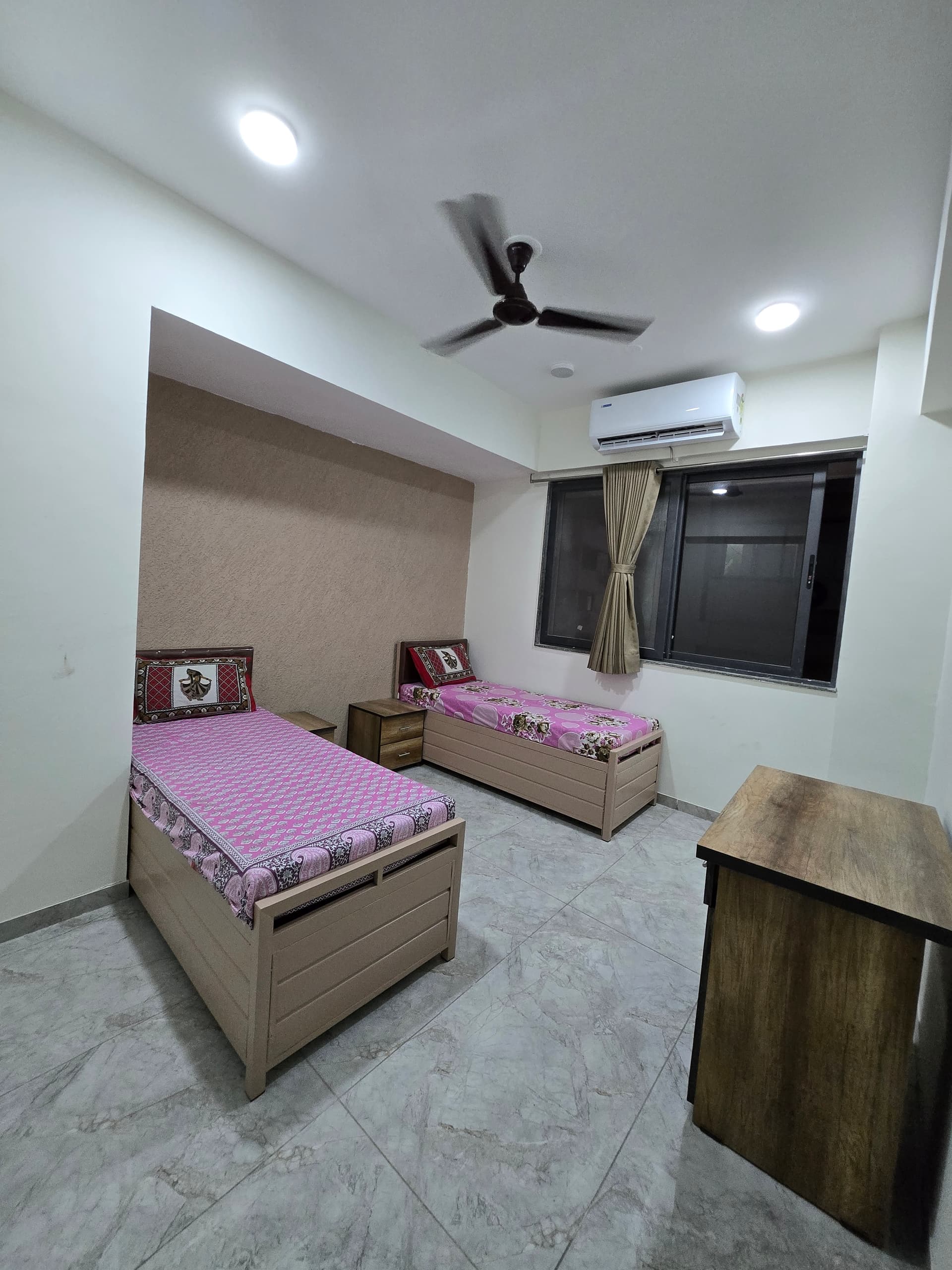 Double sharing room view at Mansarovar Girls PG near GLS University, Ahmedabad